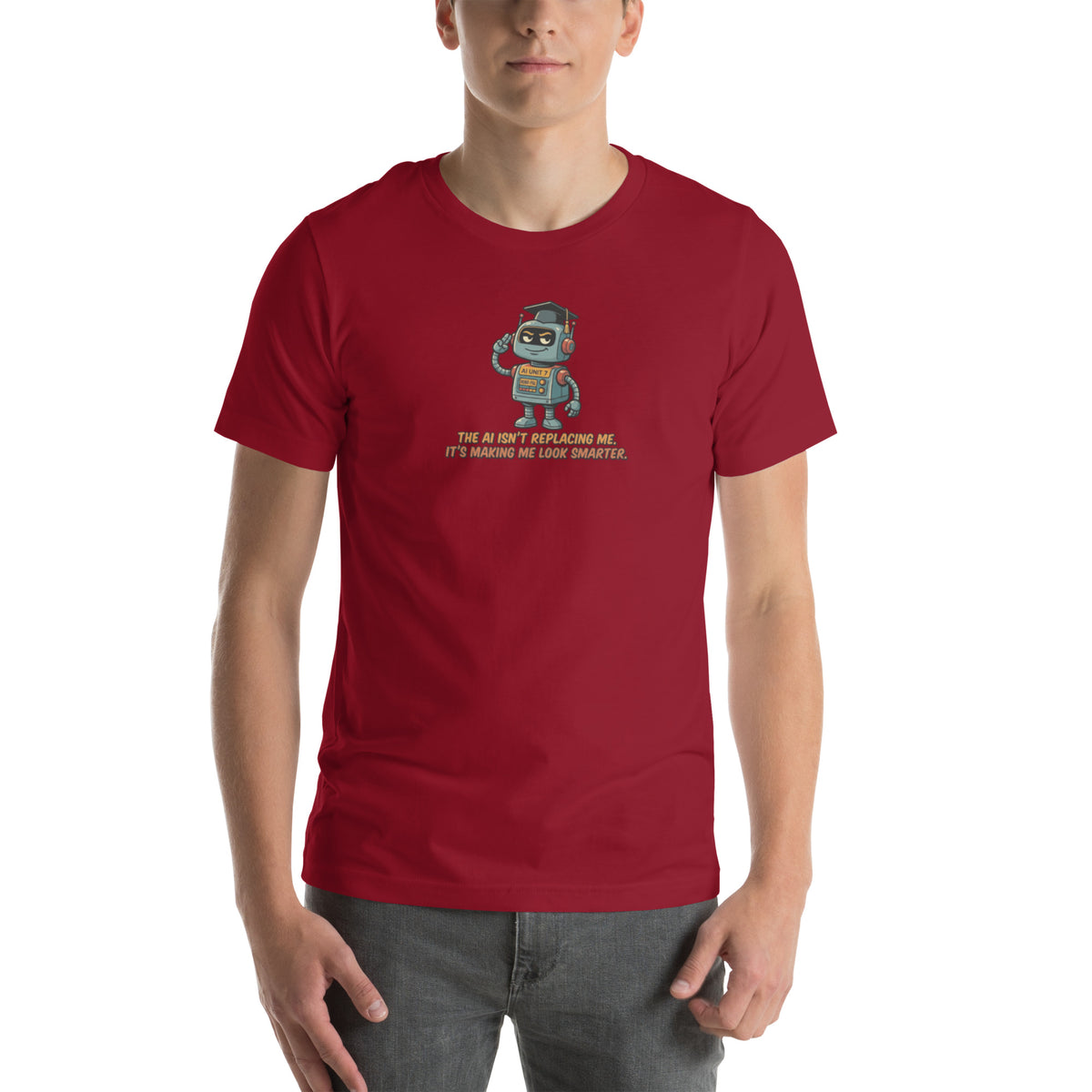 Ai Isn't Replacing Me Unisex t-shirt funny AI anxiety tee, Cardinal, front design - robot mascot in a graduation cap, "The AI isn't replacing me, it's making me look smarter"